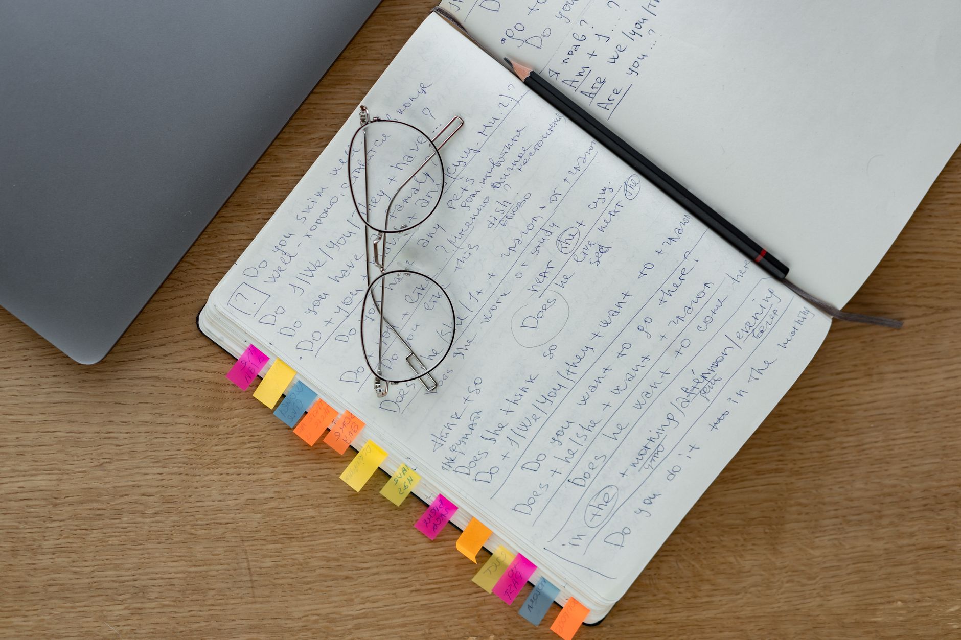 Study desk with laptop and notebook for online learning