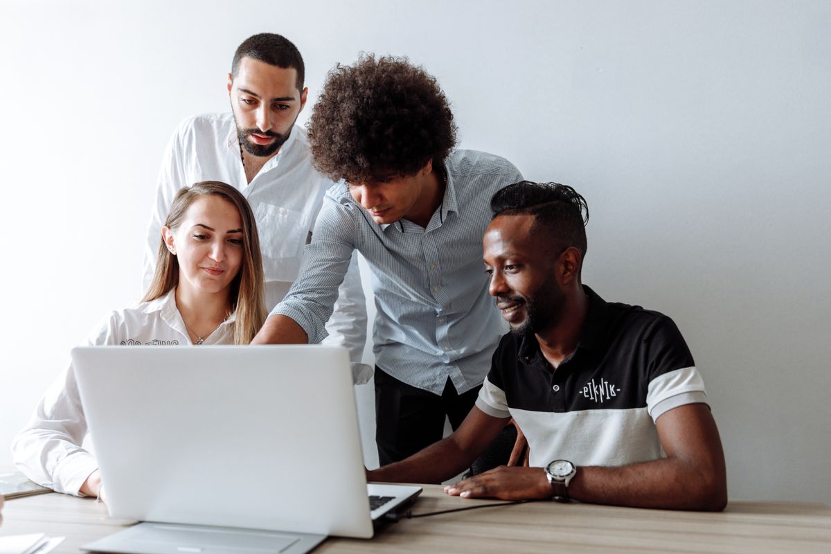 Diverse team collaborating in a modern office