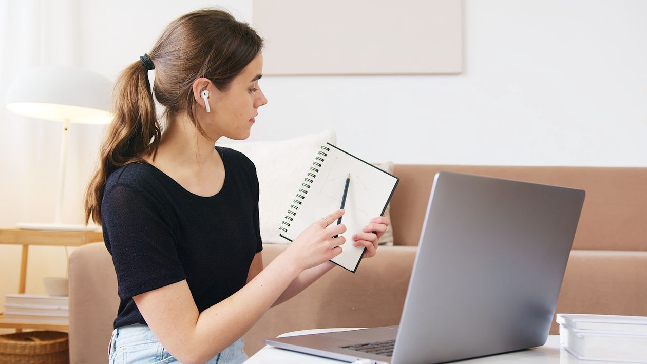 Adult learner taking an online course on a laptop